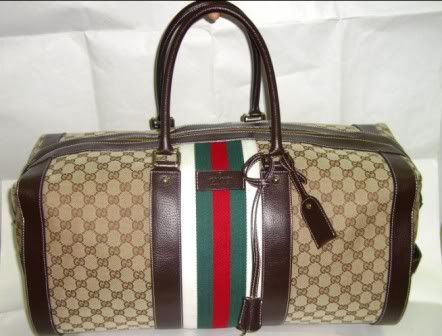 gucciluggage6.jpg sm travel bag $100 image by pamelas-closet
