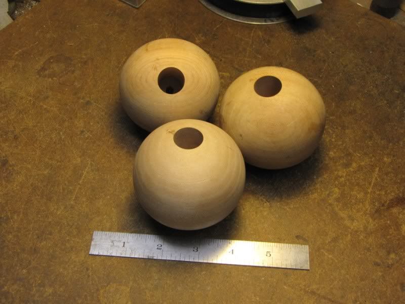 Drilling holes in spheres